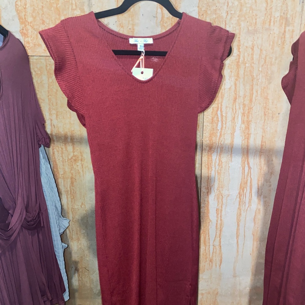 She + sky red dress